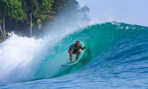 drew brophy surfing a wave in panama after surviving covid hospital protocol